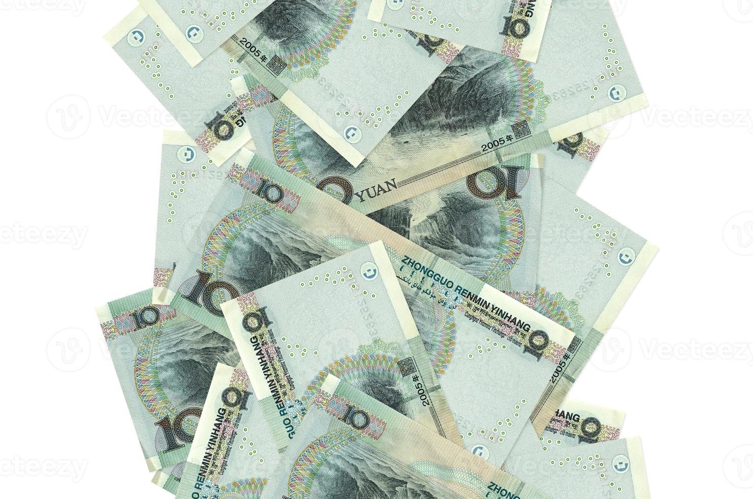 10 Chinese yuan bills flying down isolated on white. Many banknotes falling with white copyspace on left and right side photo