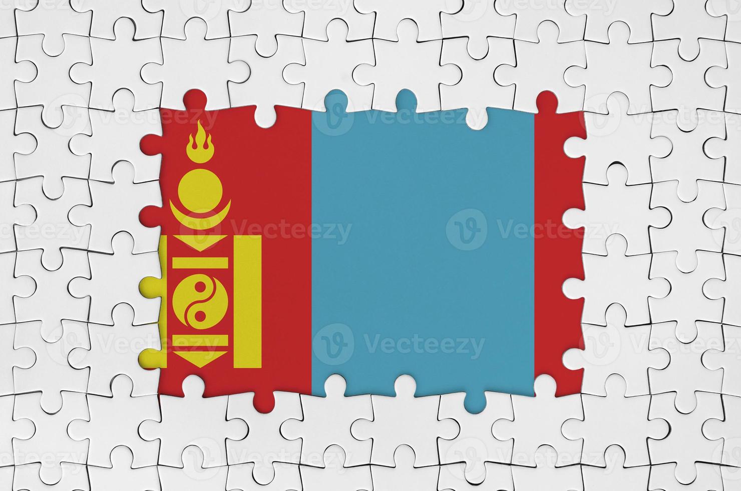 Mongolia flag in frame of white puzzle pieces with missing central part photo
