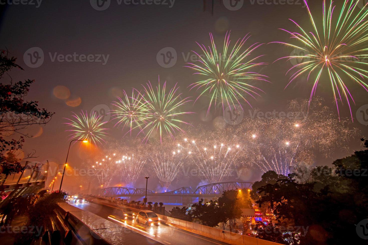 Colorful fireworks from Vijit Chao Phraya on Buddhayodfa Chulalok Maharat Bridge, Bangkok, Thailand. photo