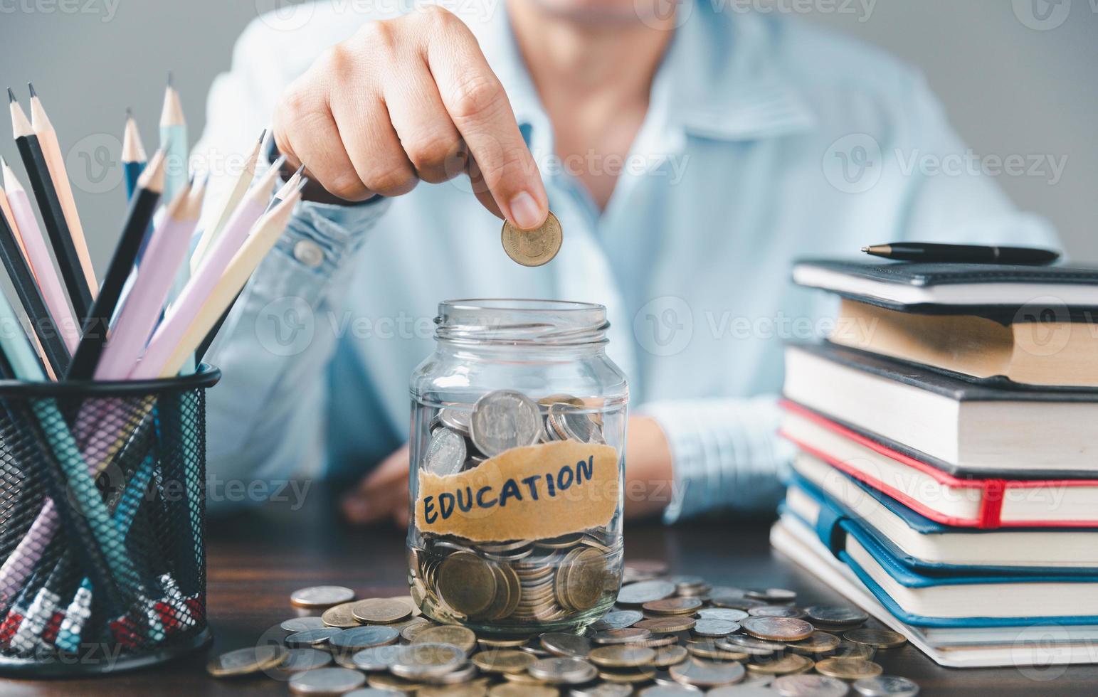 Saving money coin with banking investment, finance education concept. Planning student loan for studying abroad for college or university degree. Future children's education fund cash. Growing saving photo