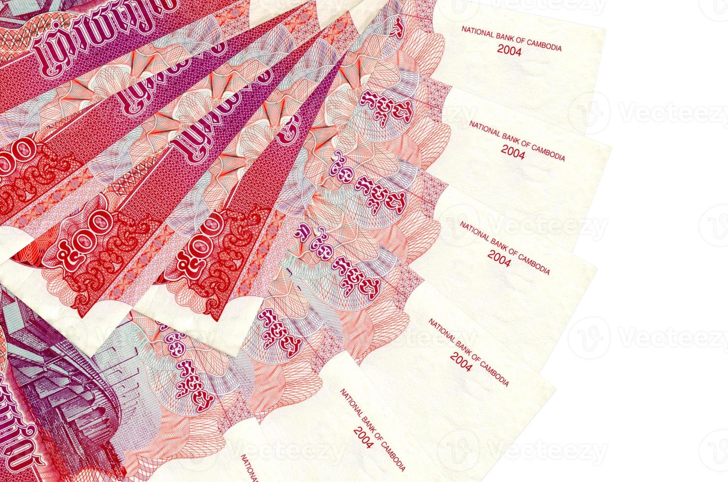 500 Cambodian riels bills lies isolated on white background with copy space stacked in fan shape close up photo