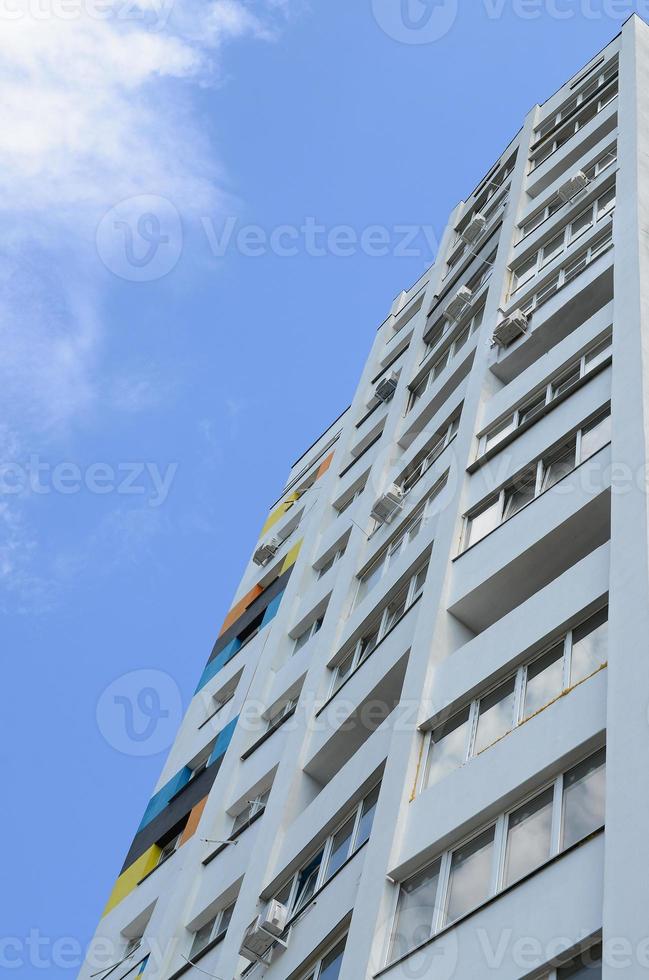 New multy storey residential building and blue sky photo