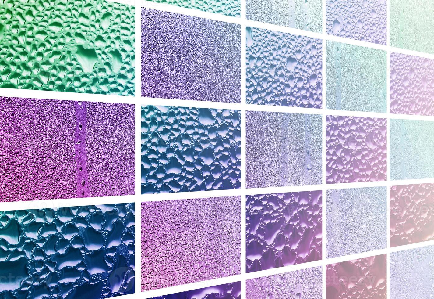 A collage of many different fragments of glass, decorated with rain drops from the condensate. Purple and violet tones photo