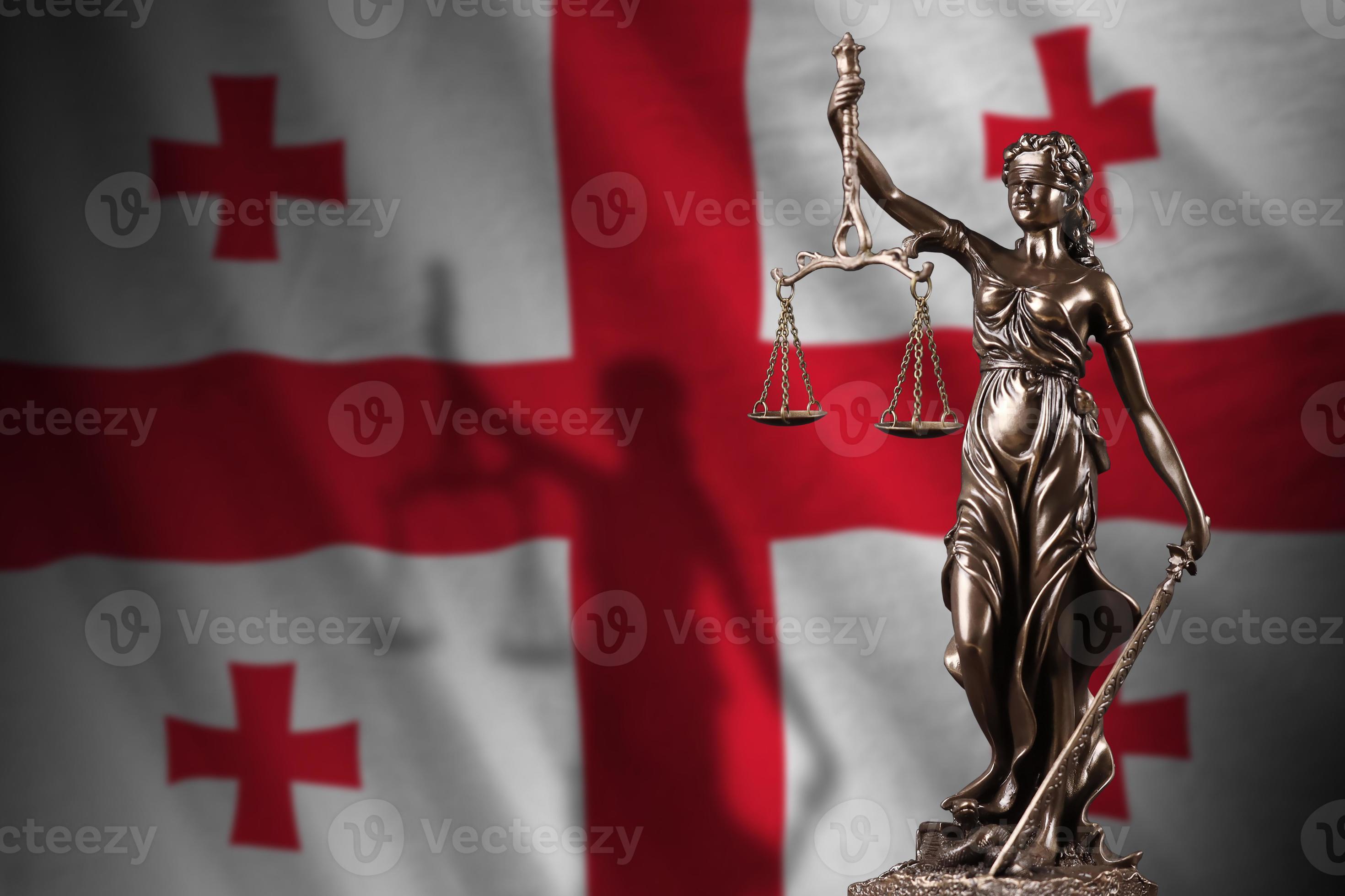 flag with statue of lady justice and judicial scales in dark