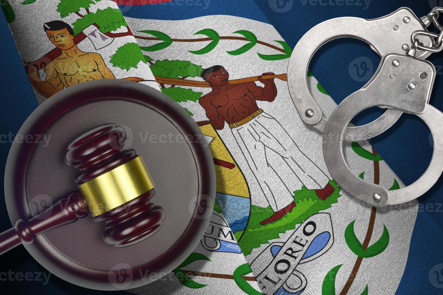 Belize flag with judge mallet and handcuffs in dark room. Concept of criminal and punishment, background for judgement topics photo
