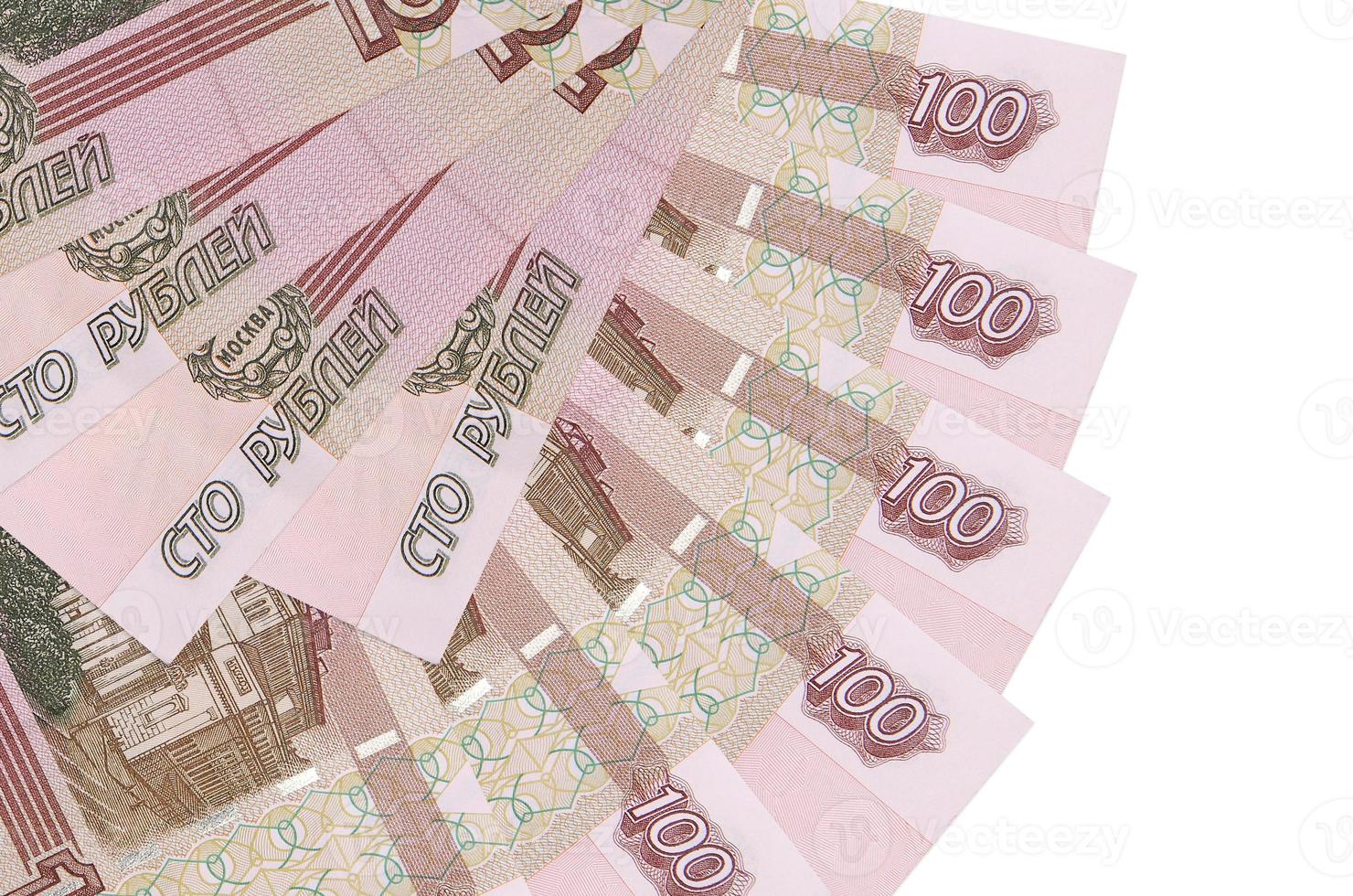 100 russian rubles bills lies isolated on white background with copy space stacked in fan shape close up photo