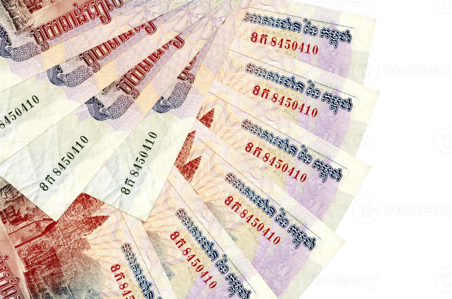 1000 Cambodian riels bills lies isolated on white background with copy space stacked in fan shape close up photo