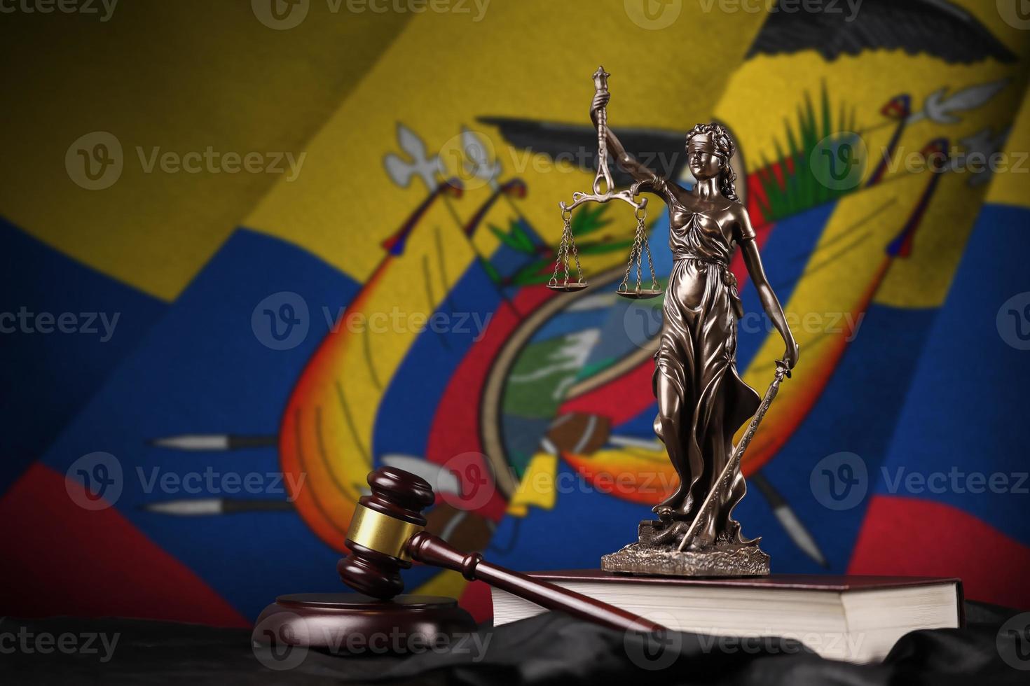 Ecuador flag with statue of lady justice, constitution and judge hammer on black drapery. Concept of judgement and guilt photo