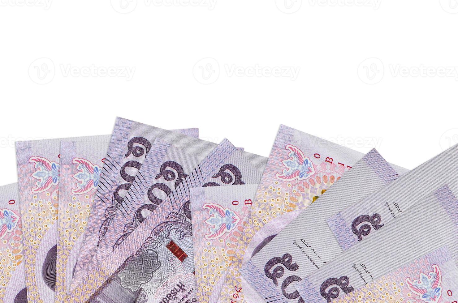 500 Thai baht bills lies on bottom side of screen isolated on white background with copy space. Background banner template photo