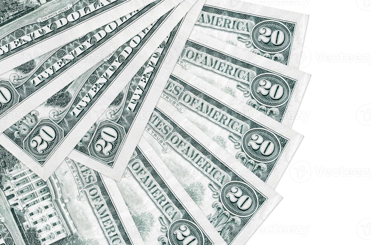 20 US dollars bills lies isolated on white background with copy space stacked in fan shape close up photo