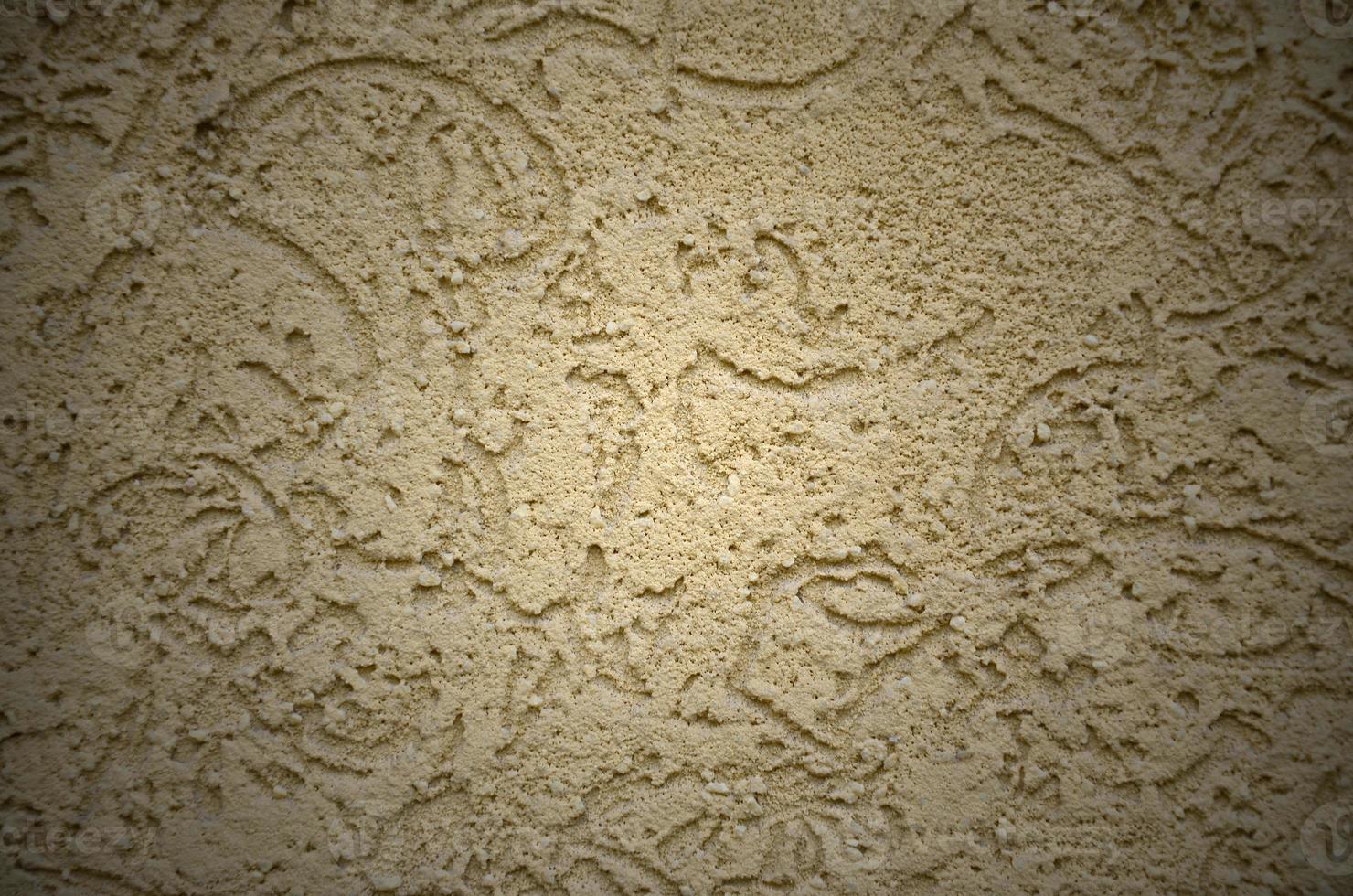 The texture of the beige decorative plaster in bark beetle style photo