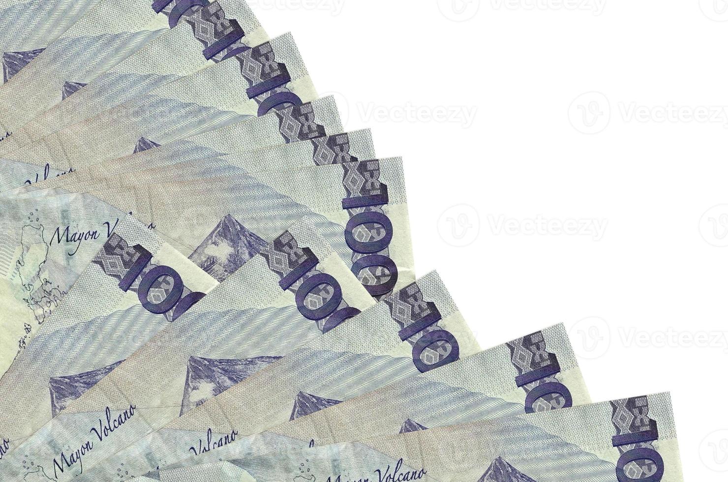 100 Philippine piso bills lies isolated on white background with copy space stacked in fan close up photo