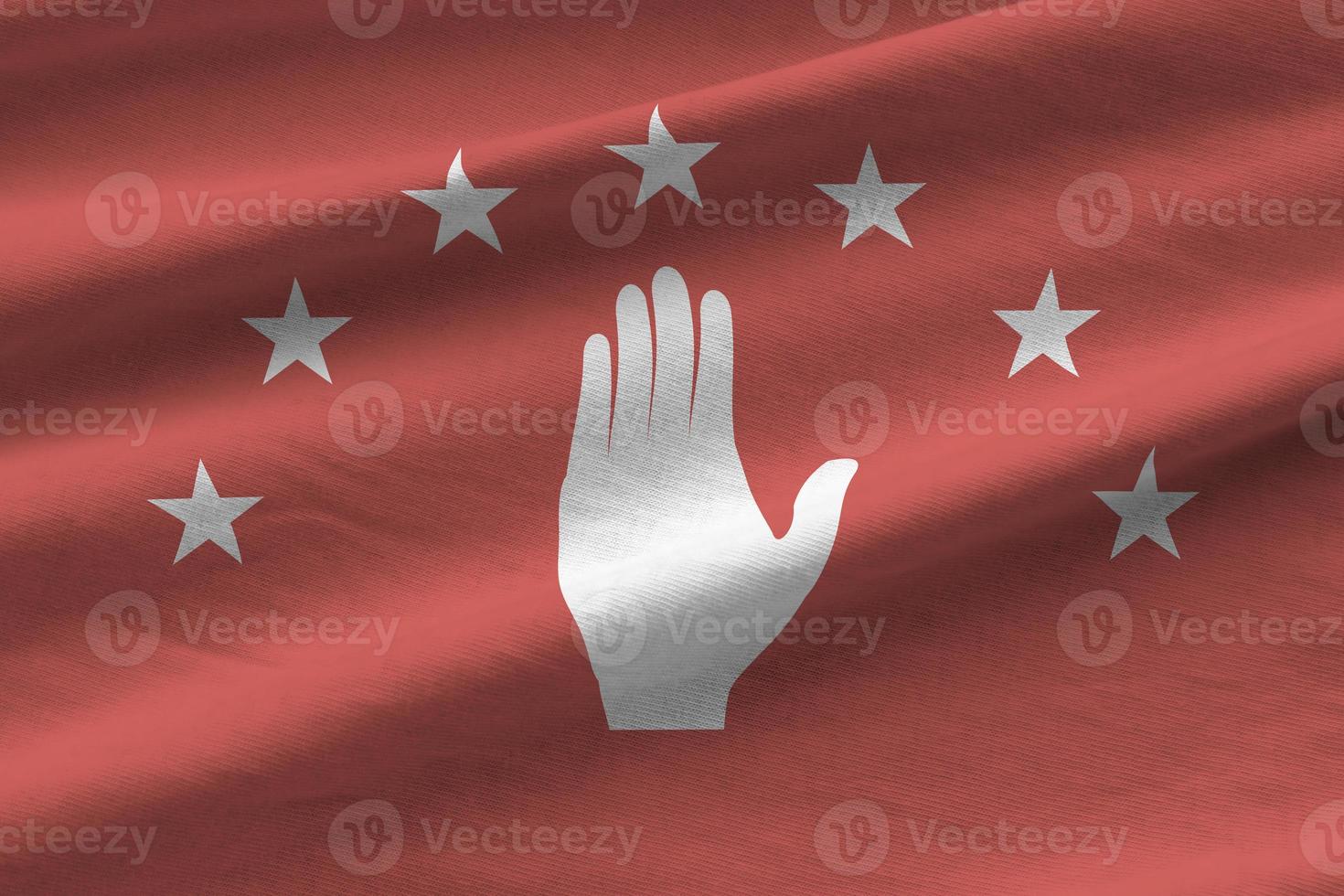 Abkhazia flag with big folds waving close up under the studio light indoors. The official symbols and colors in banner photo