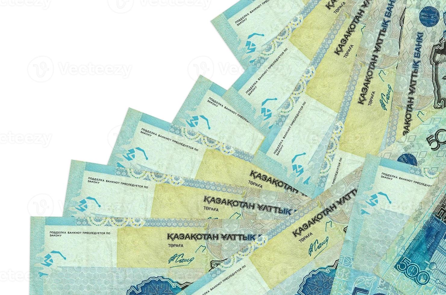 500 Kazakhstani tenge bills lies in different order isolated on white. Local banking or money making concept photo