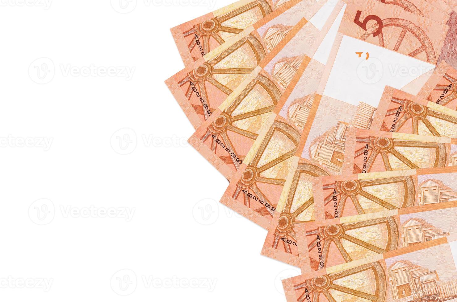 5 Belorussian rubles bills lies isolated on white background with copy space. Rich life conceptual background photo