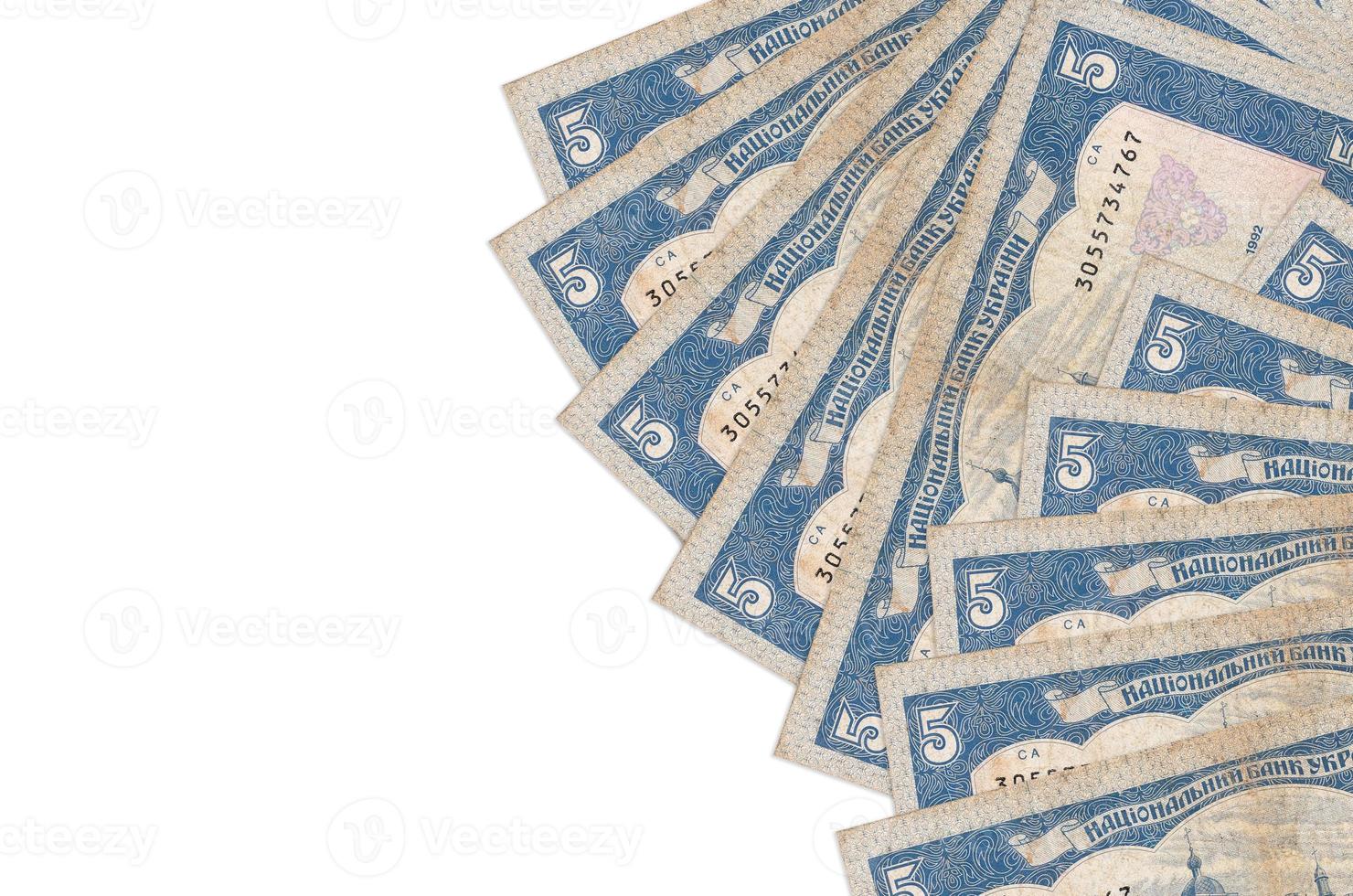 5 Ukrainian hryvnias bills lies isolated on white background with copy space. Rich life conceptual background photo