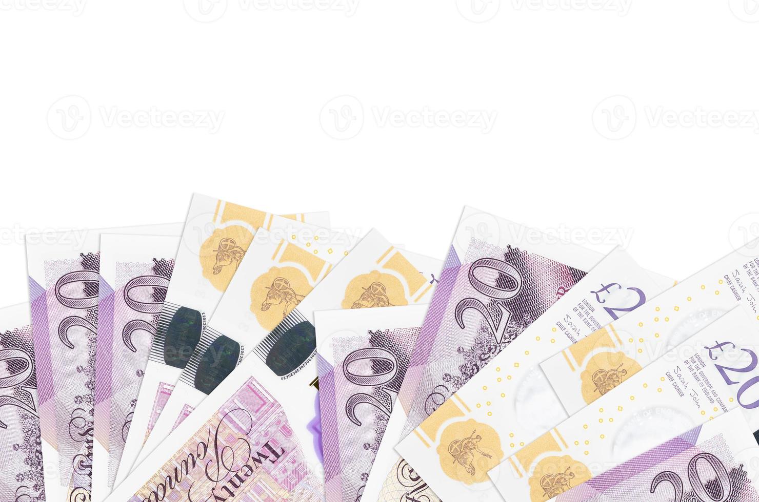 20 British pounds bills lies on bottom side of screen isolated on white background with copy space. Background banner template photo
