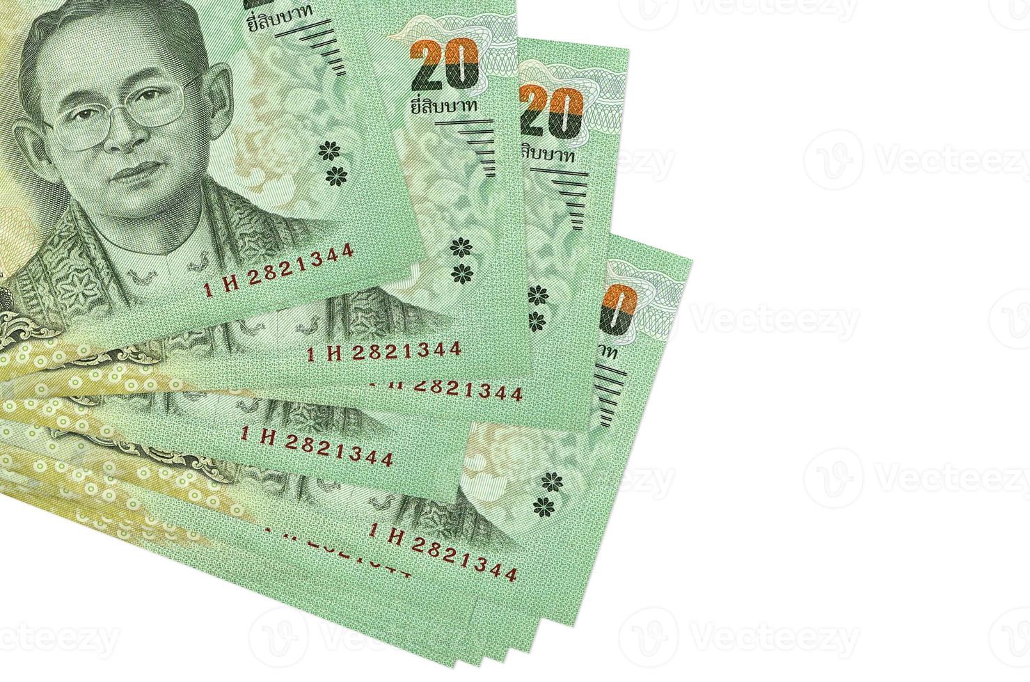 20 Thai Baht bills lies in small bunch or pack isolated on white. Mockup with copy space. Business and currency exchange photo