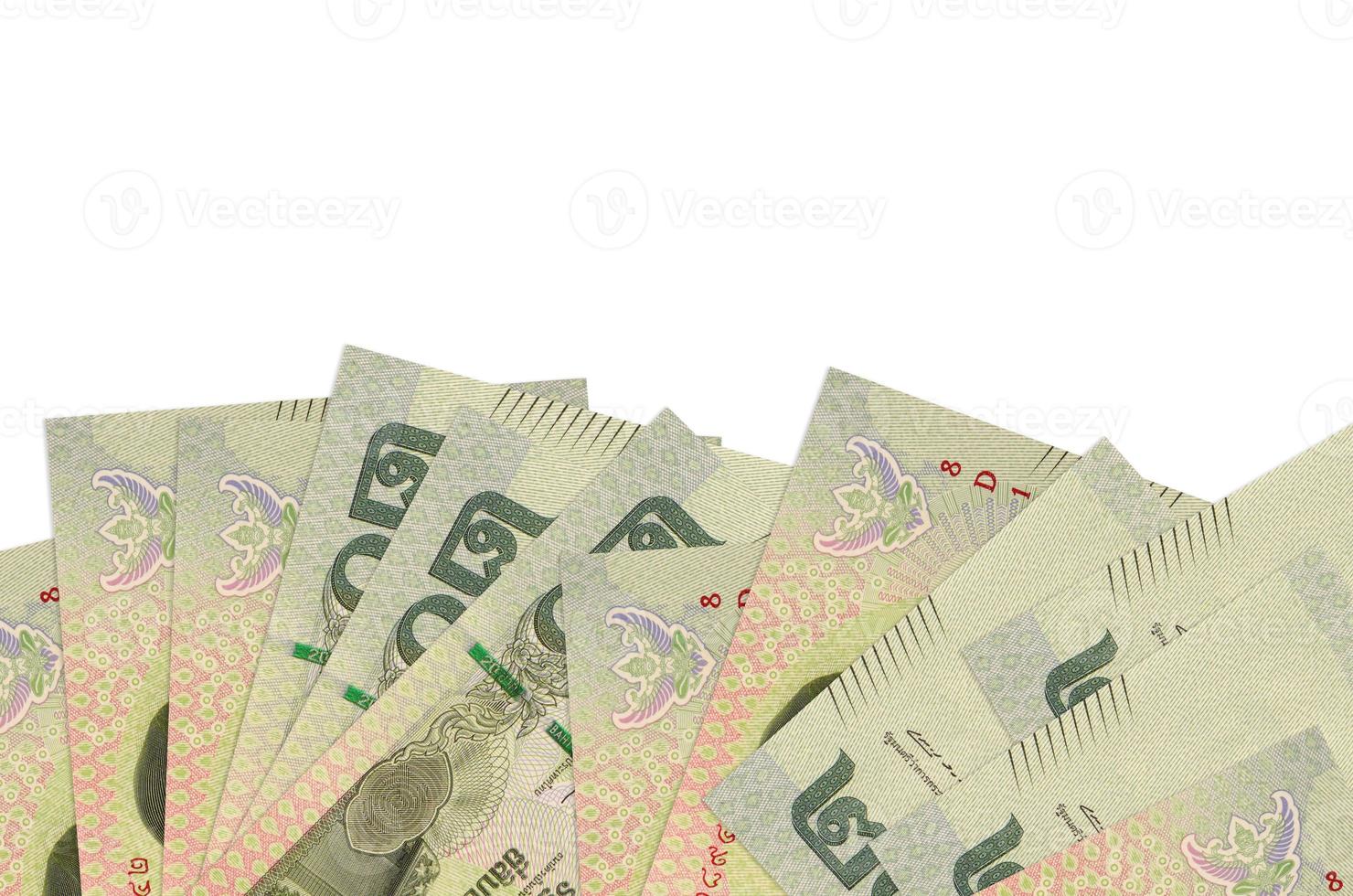 20 Thai Baht bills lies on bottom side of screen isolated on white background with copy space. Background banner template photo