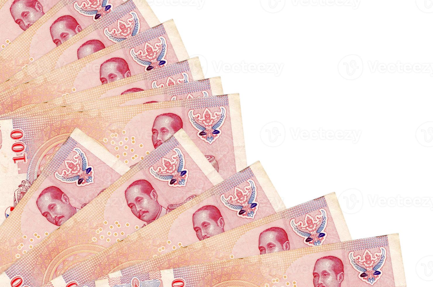 100 Thai Baht bills lies isolated on white background with copy space stacked in fan close up photo