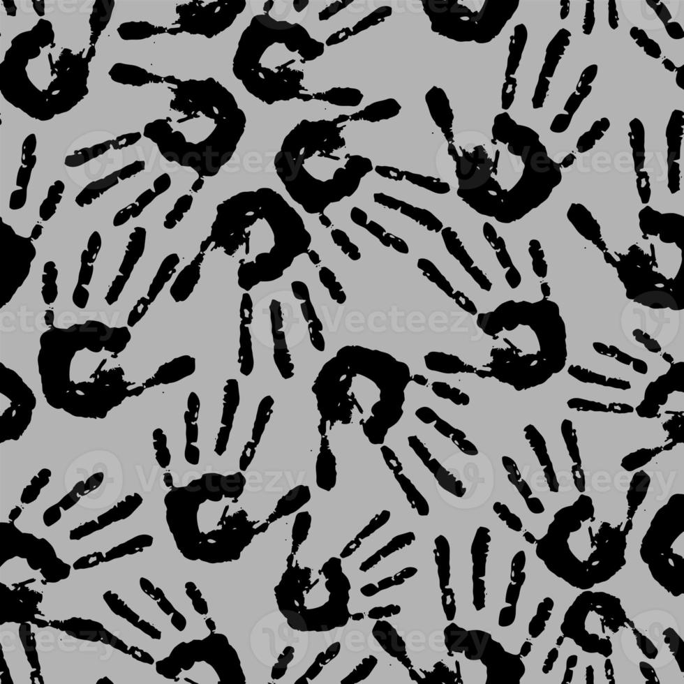 seamless abstract pattern of black handprints on a gray background, repeating texture, design photo