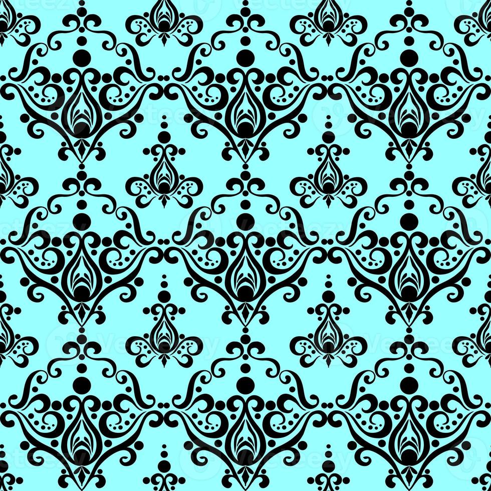 symmetrical seamless ornament tile of black graphic abstract elements on a green background, texture, design photo