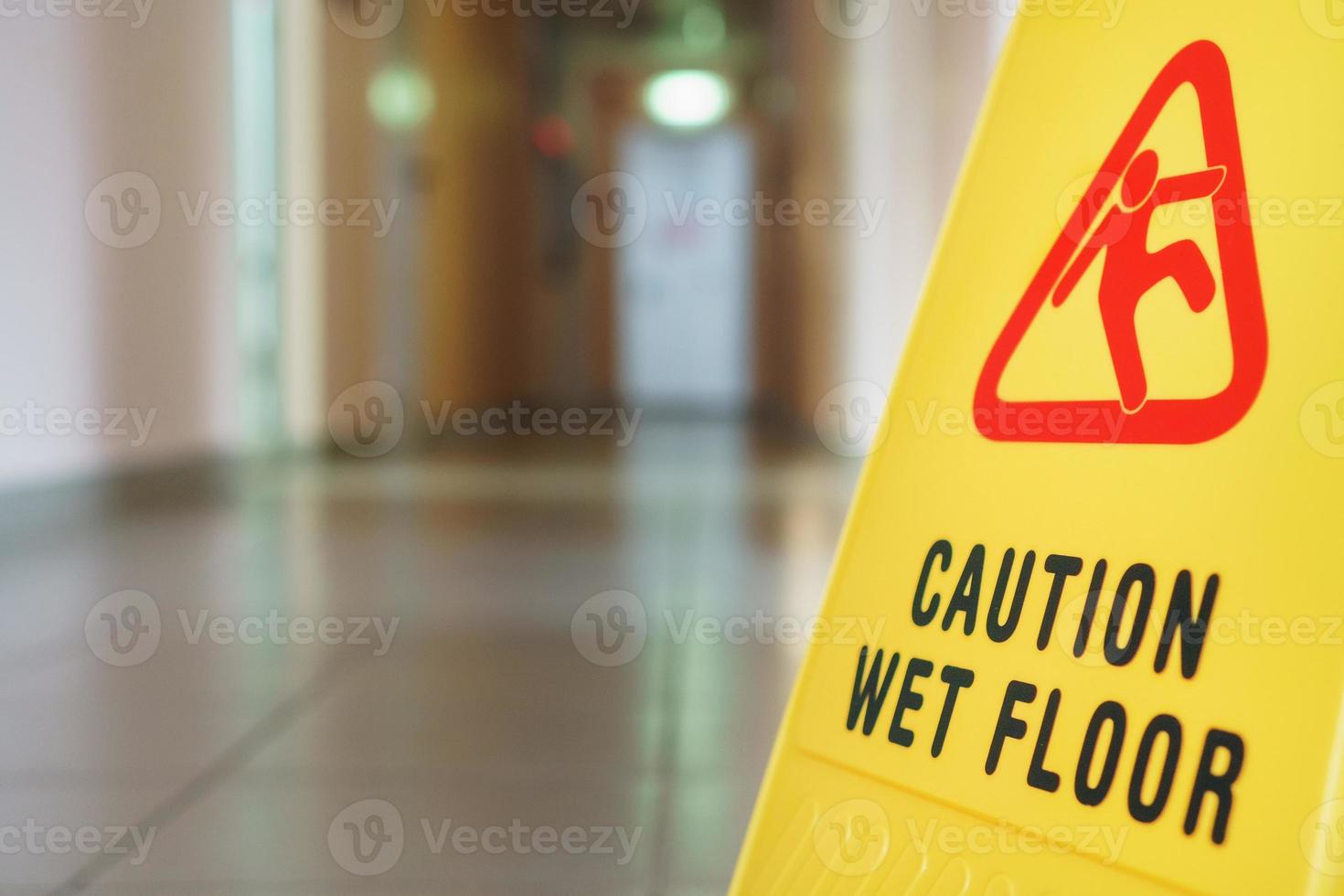 Yellow sign of slippery floor in the room after cleaning photo