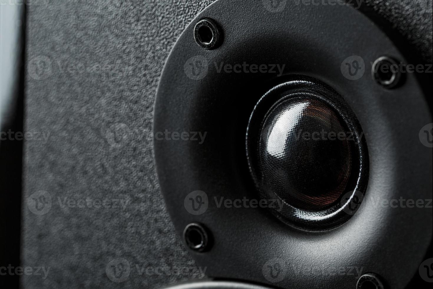 Speaker system speakers in close-up on a black background. photo