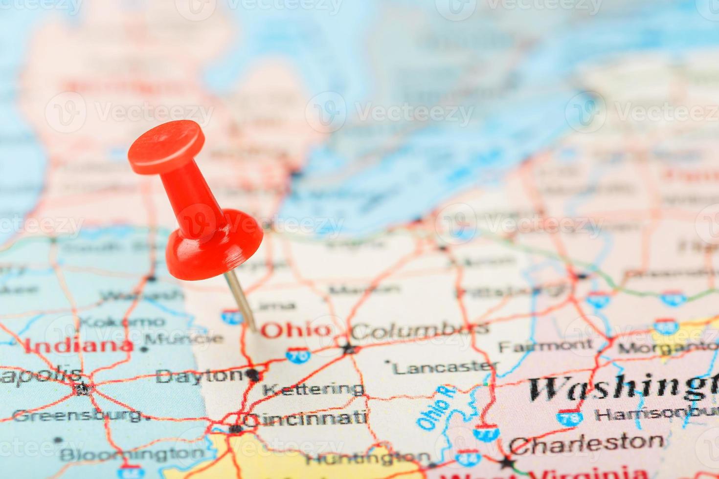 Red clerical needle on a map of USA, South Ohio and the capital Columbus. Close up map of South Ohio with red tack photo