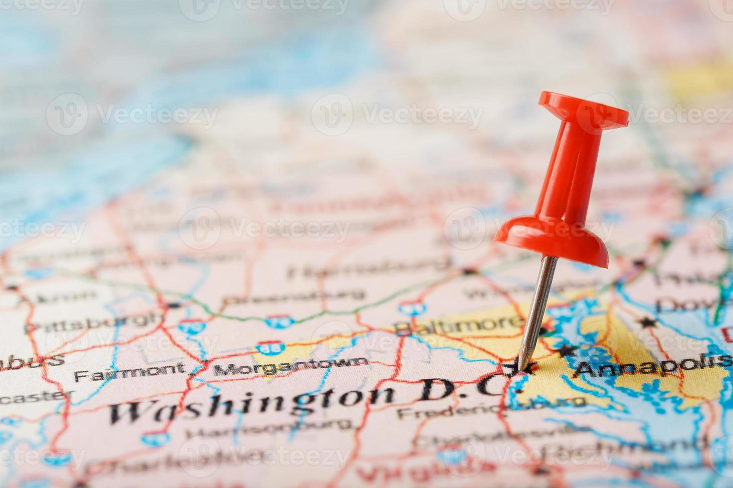 Red clerical needle on the map of USA, South Washington, DC and the capital of Richmond. Close up map of DC with red tack photo