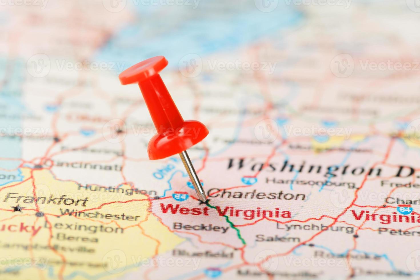 Red clerical needle on a map of USA, South West Virginia and the capital Charleston. Close up map of South West Virginia with red tack photo