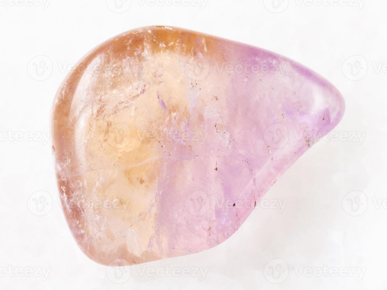 polished Ametrine gemstone on white photo