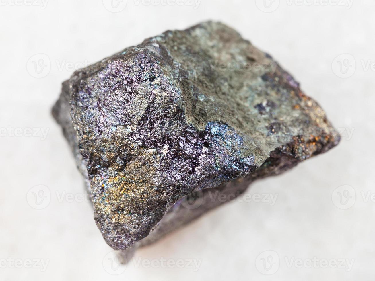 piece of bornite stone on white photo