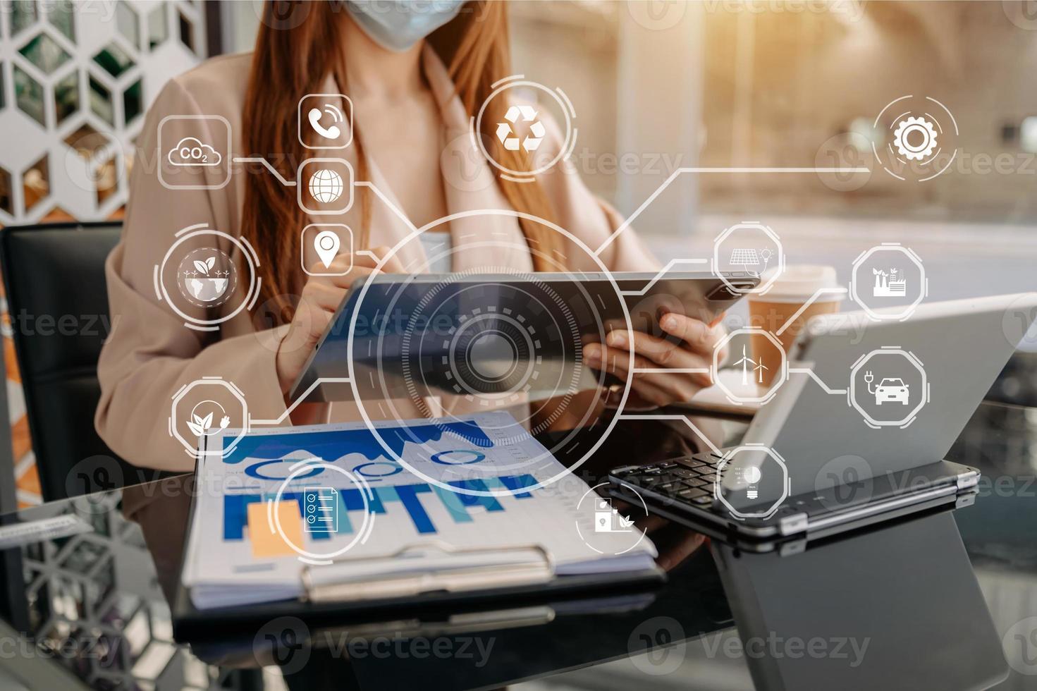 Business working with reduce CO2 concept with icons, global warming such as reforest green factory recycle and zero carbon dioxide emission concept. with VR icon at office photo