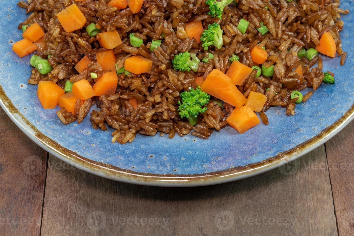 vegetable fried rice with broccoli carrot bean photo