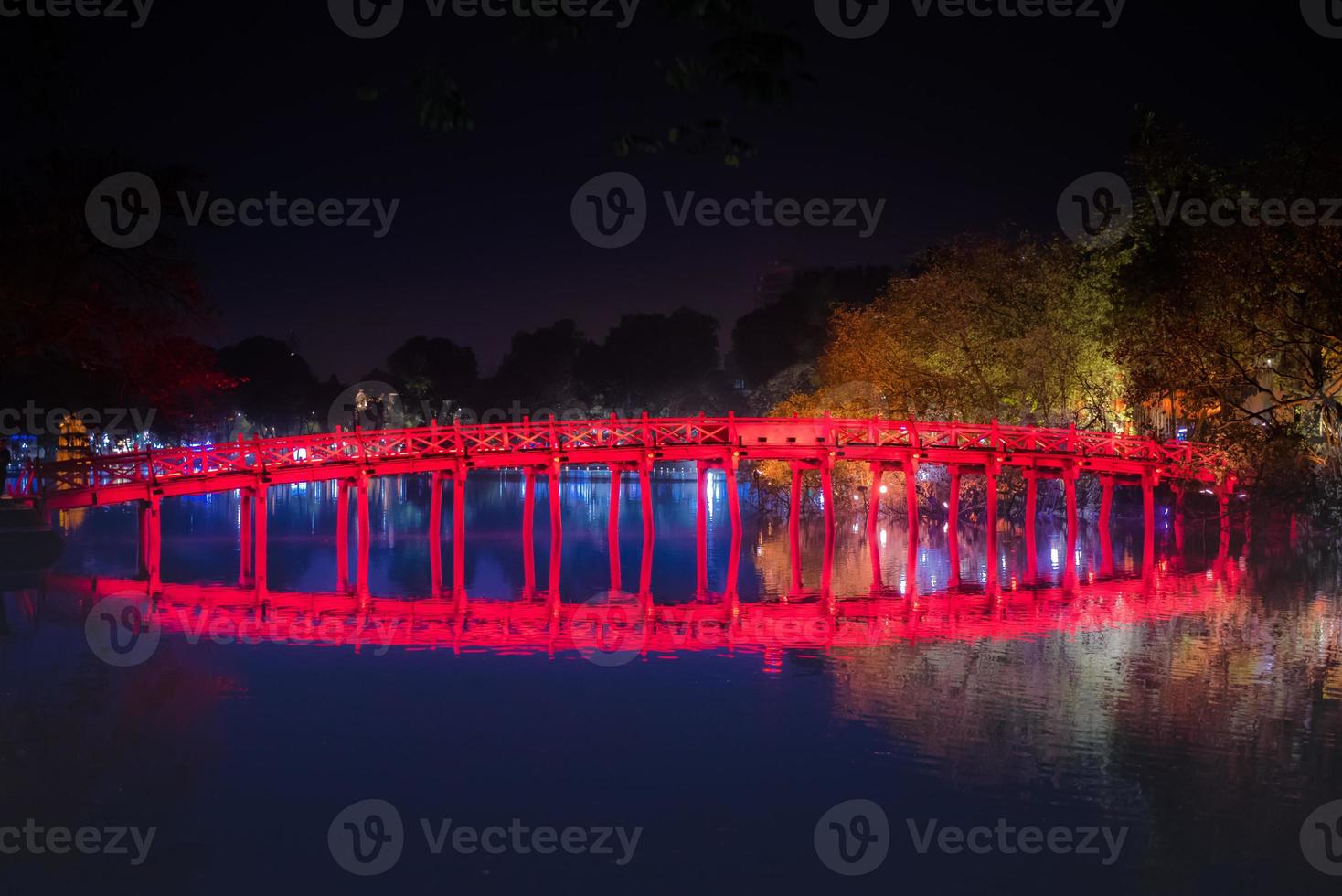 Travel in Vietnam concept, Red bridge in Hoan Kiem lake, Ha Noi, Vietnam, landmark, scenery. photo