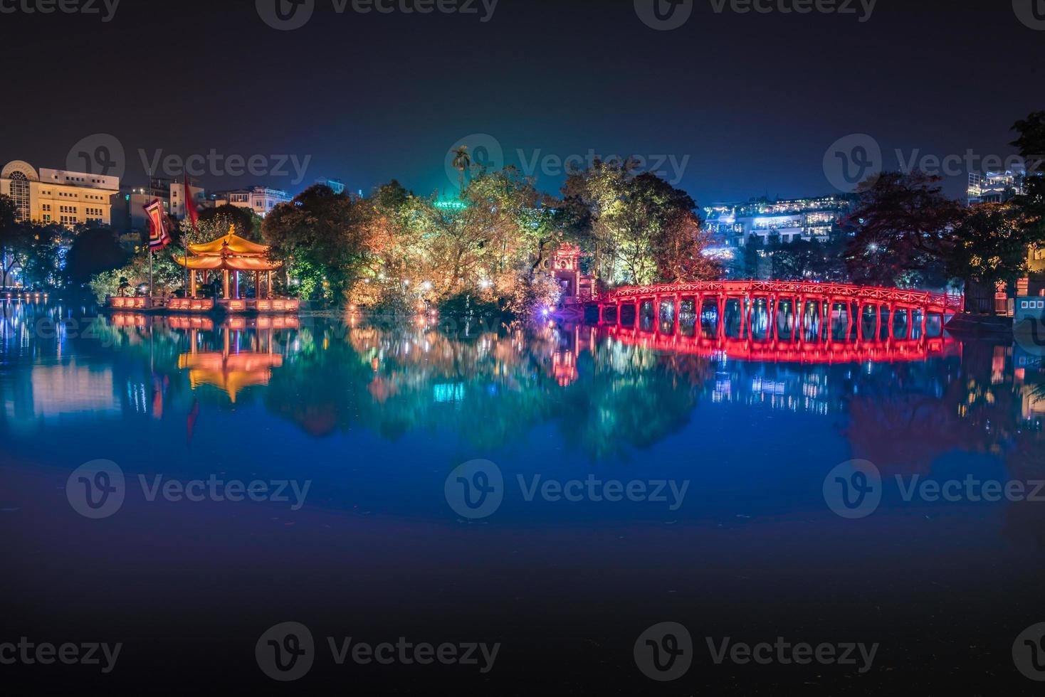 Travel in Vietnam concept, Red bridge in Hoan Kiem lake, Ha Noi, Vietnam, landmark, scenery. photo