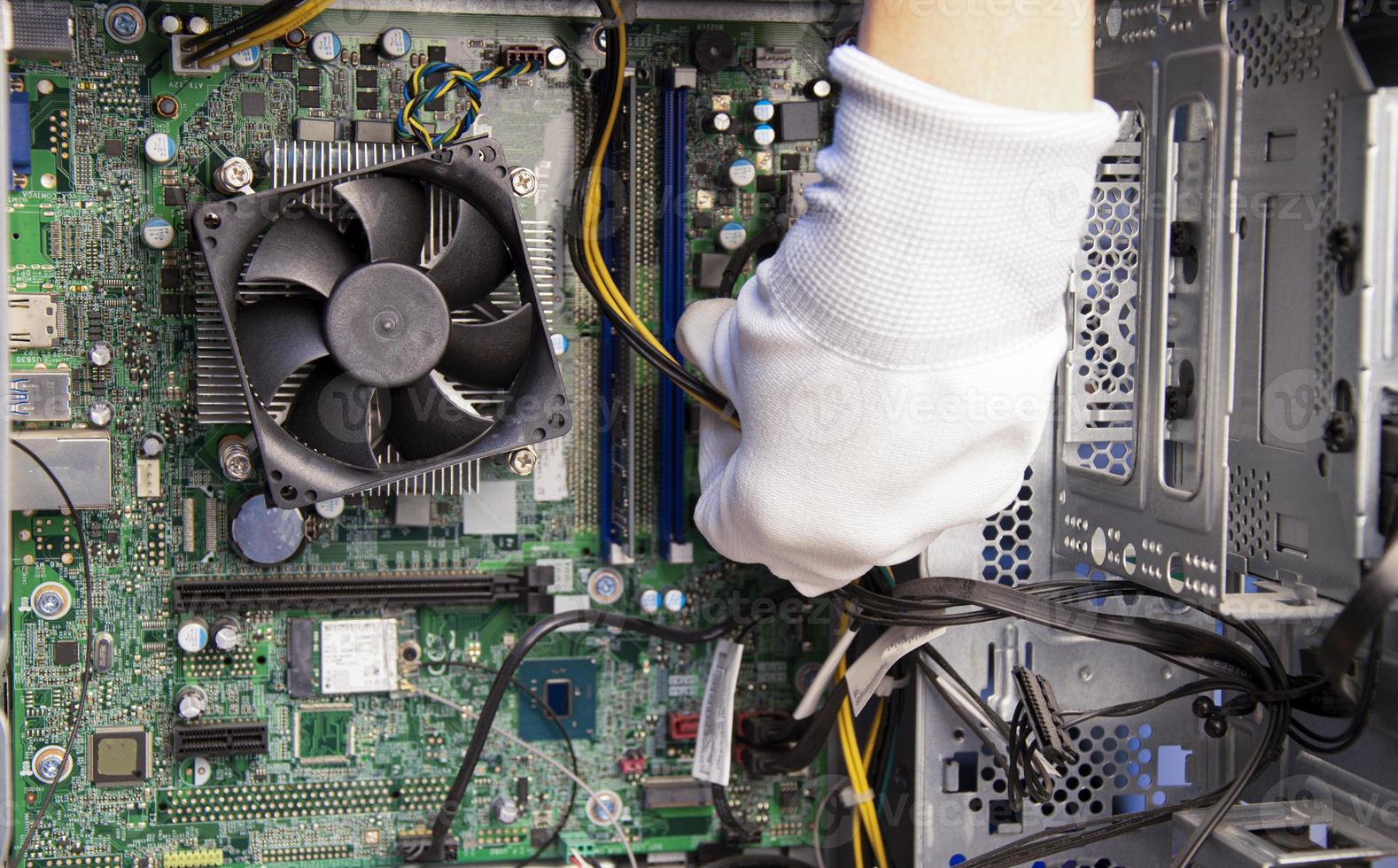 top view mechanic repairing computer photo