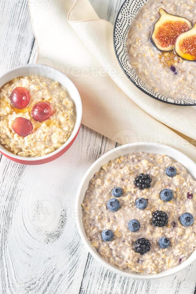 Three bowls of oatmeal photo