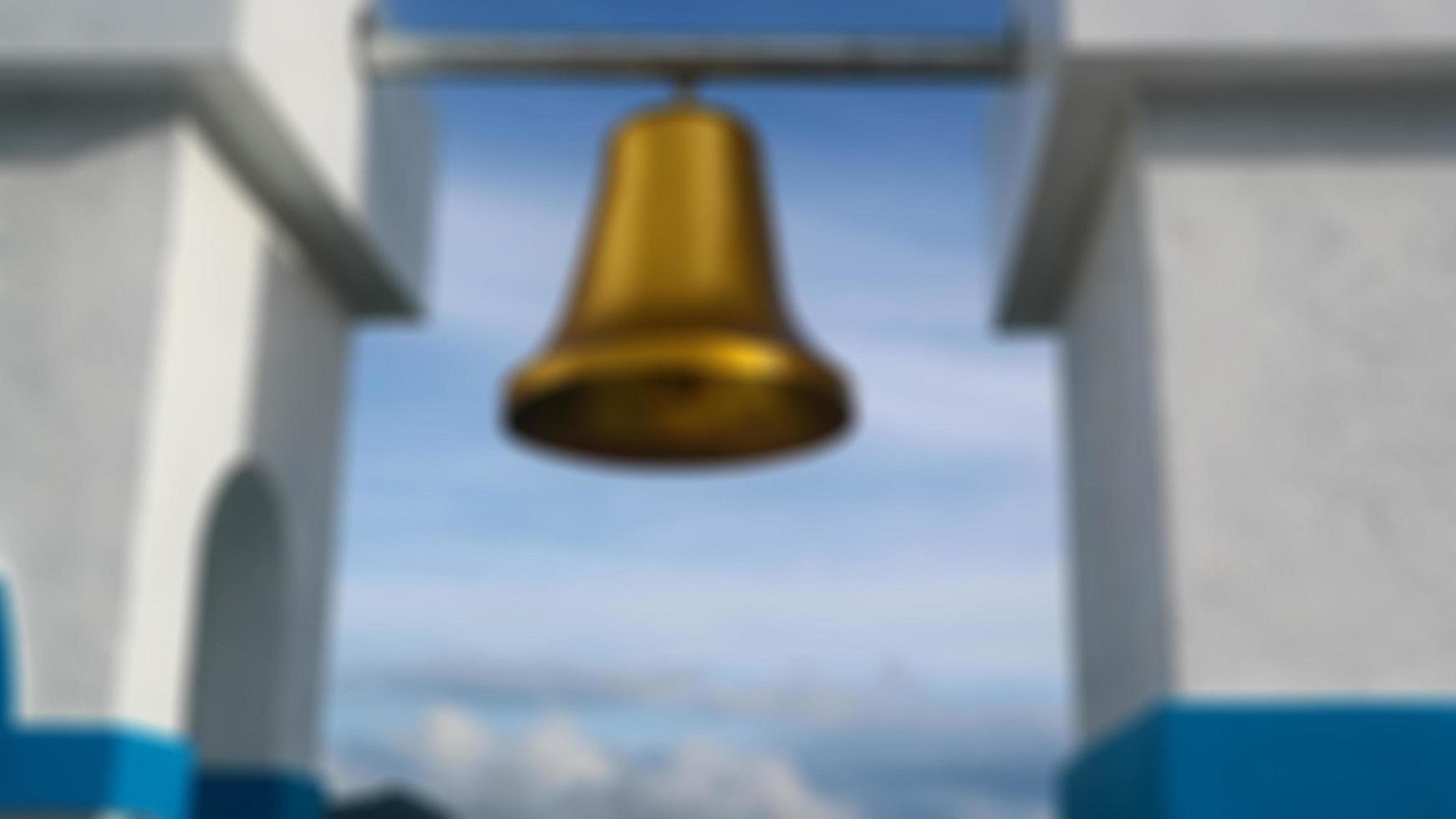 a golden bell and blue sky photo