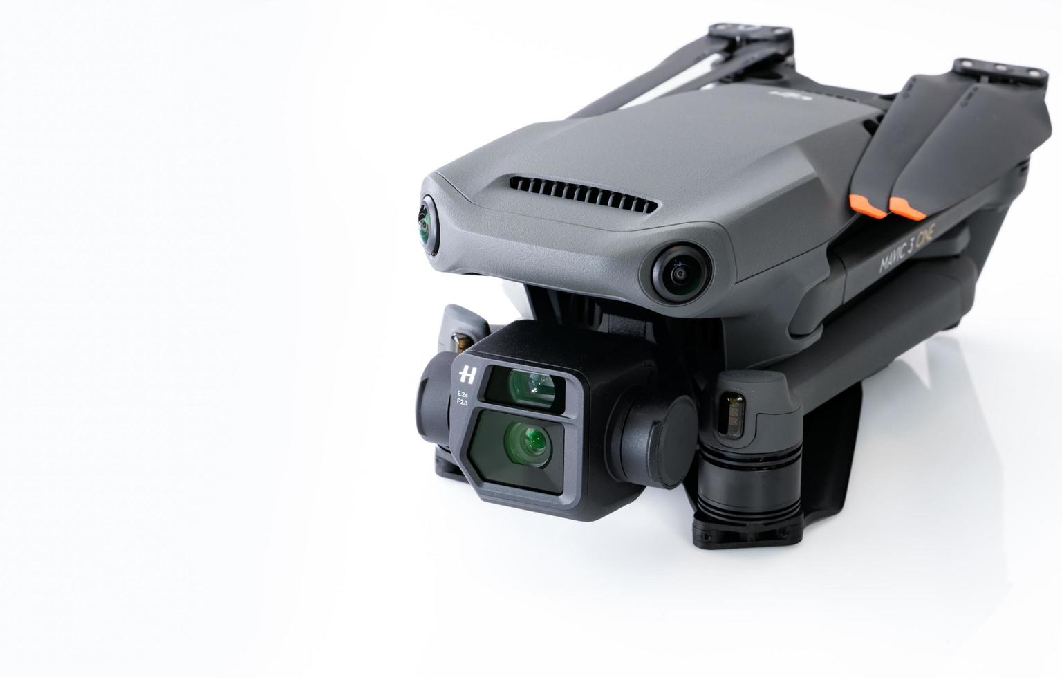 CHONBURI, THAILAND-OCTOBER 31, 2022 DJI Mavic 3 Cine drone on white background. UAV or unmanned aerial vehicle. Quadcopter drone aircraft with digital camera. Modern remote control aerial drone. photo