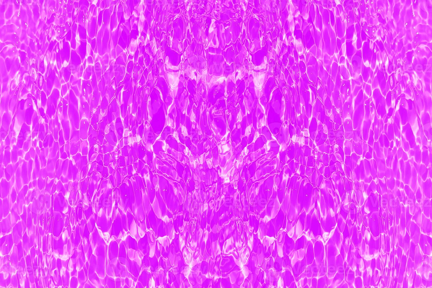 Defocus blurred transparent purple colored clear calm water surface texture with splashes and bubbles. Trendy abstract nature background. Water waves in sunlight with copy space. Pink watercolor shine photo