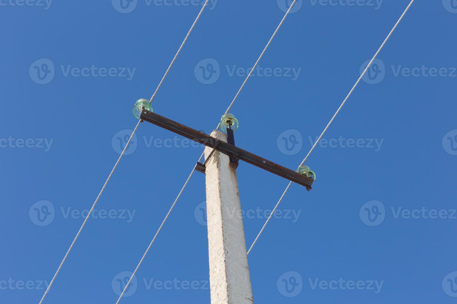 High voltage power line. Electric power line support and wires against the blue sky. 14940904