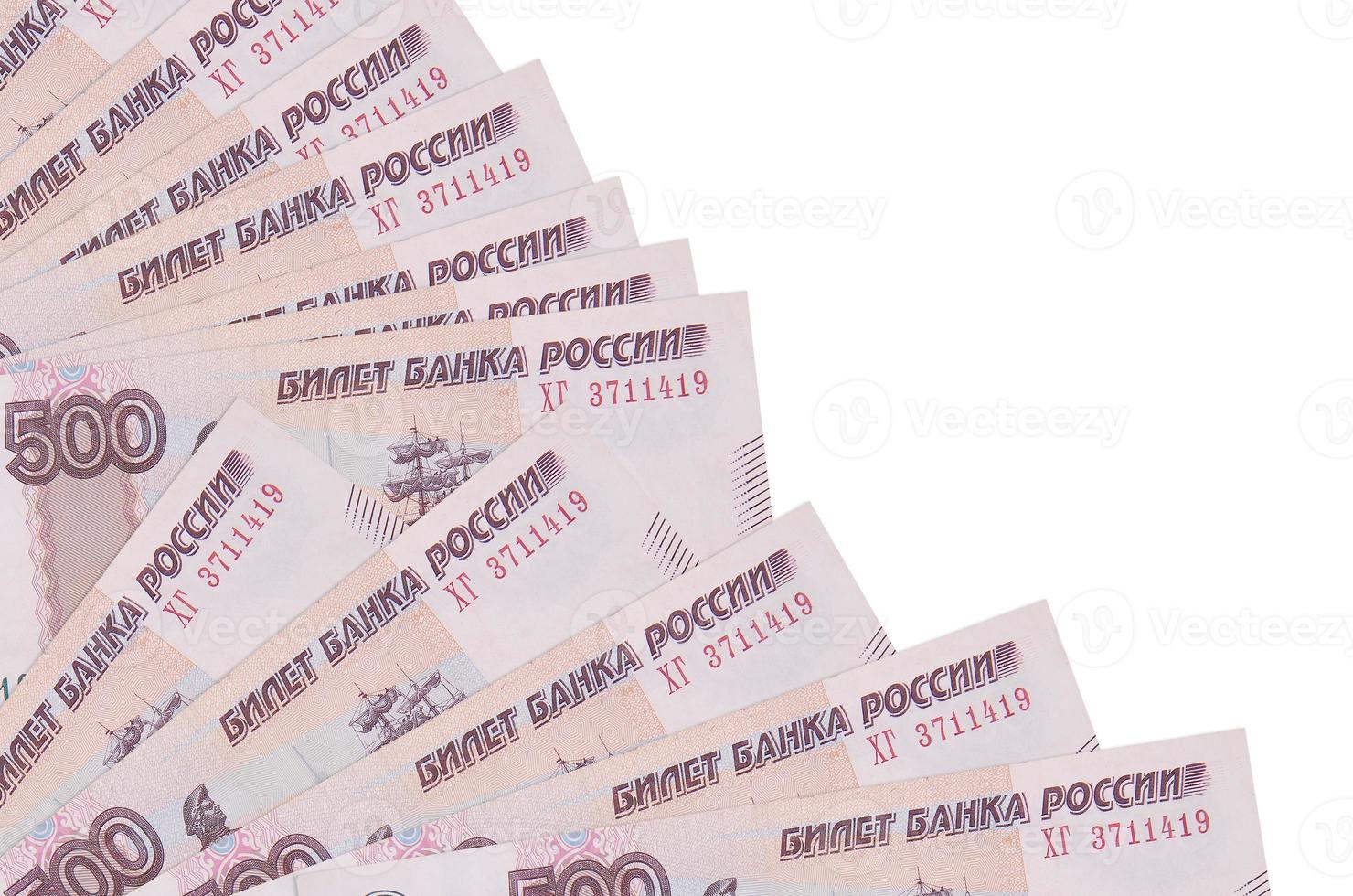 500 russian rubles bills lies isolated on white background with copy space stacked in fan close up photo