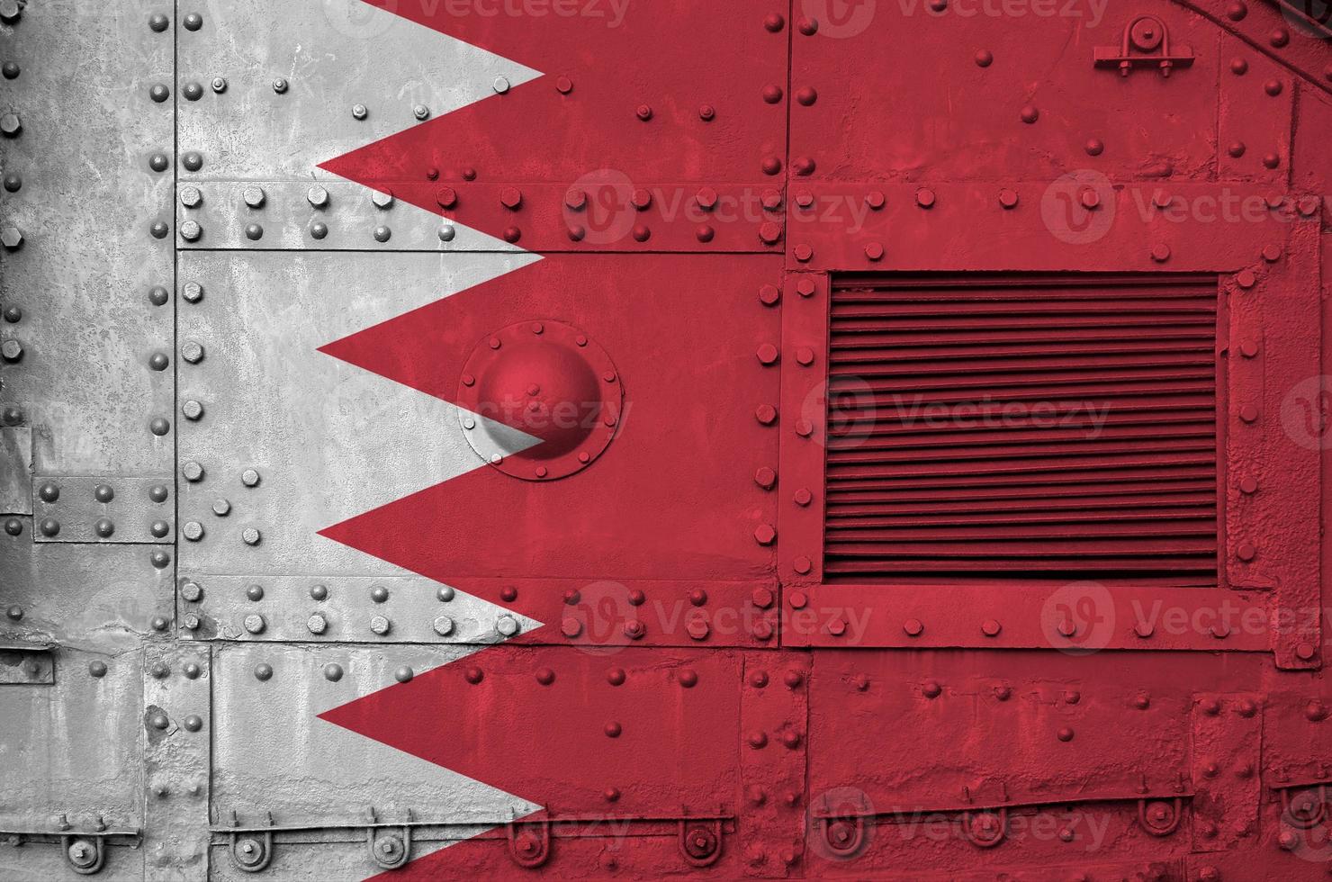 Bahrain flag depicted on side part of military armored tank closeup. Army forces conceptual background photo