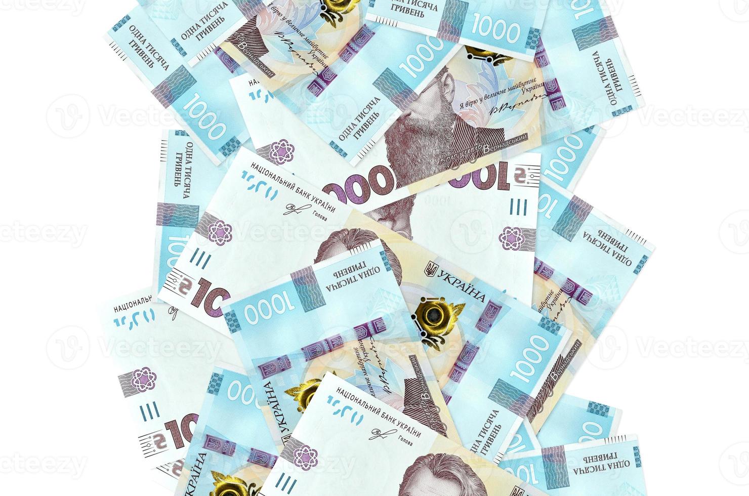 1000 Ukrainian hryvnias bills flying down isolated on white. Many banknotes falling with white copyspace on left and right side photo