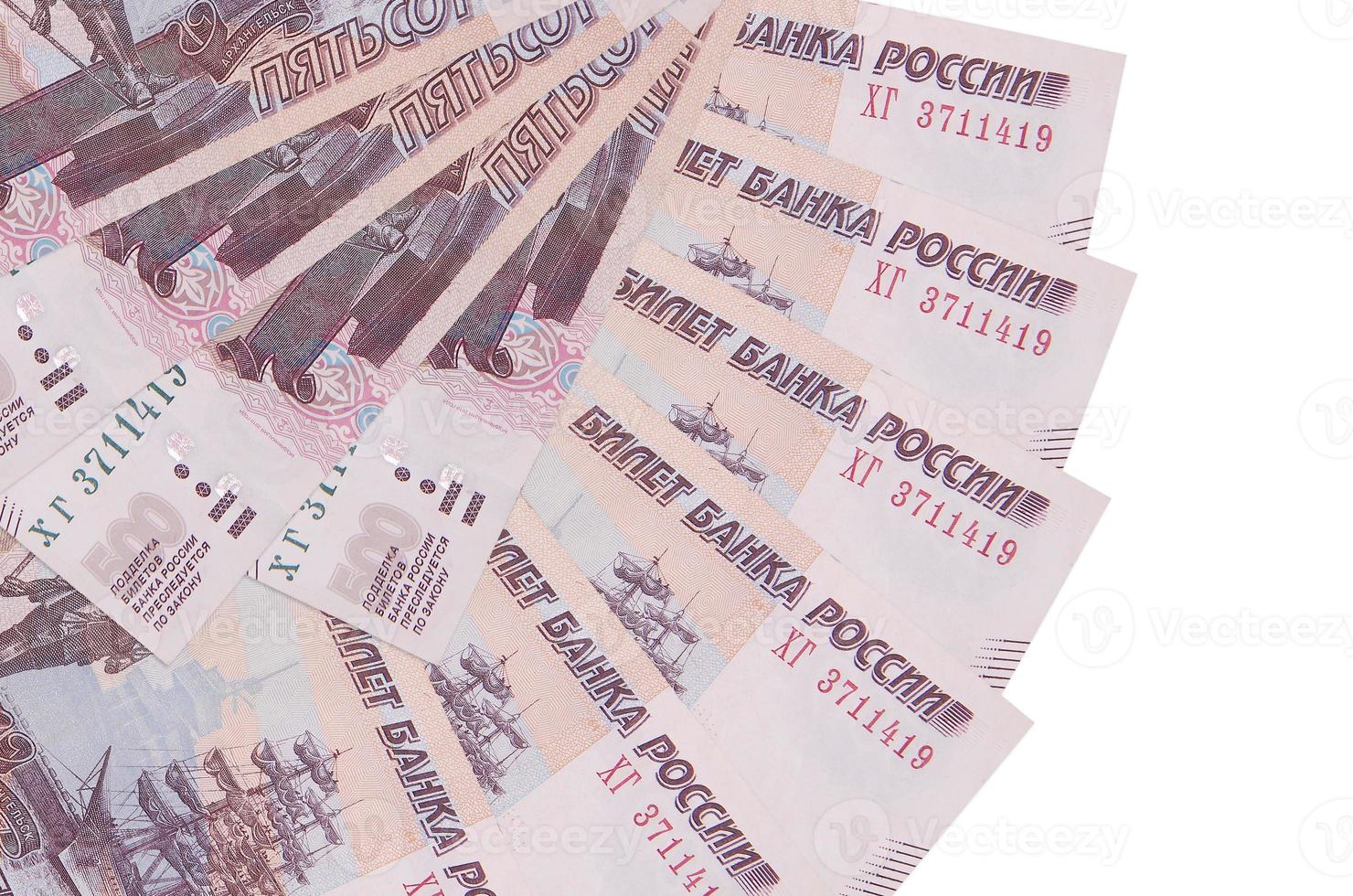 500 russian rubles bills lies isolated on white background with copy space stacked in fan shape close up photo