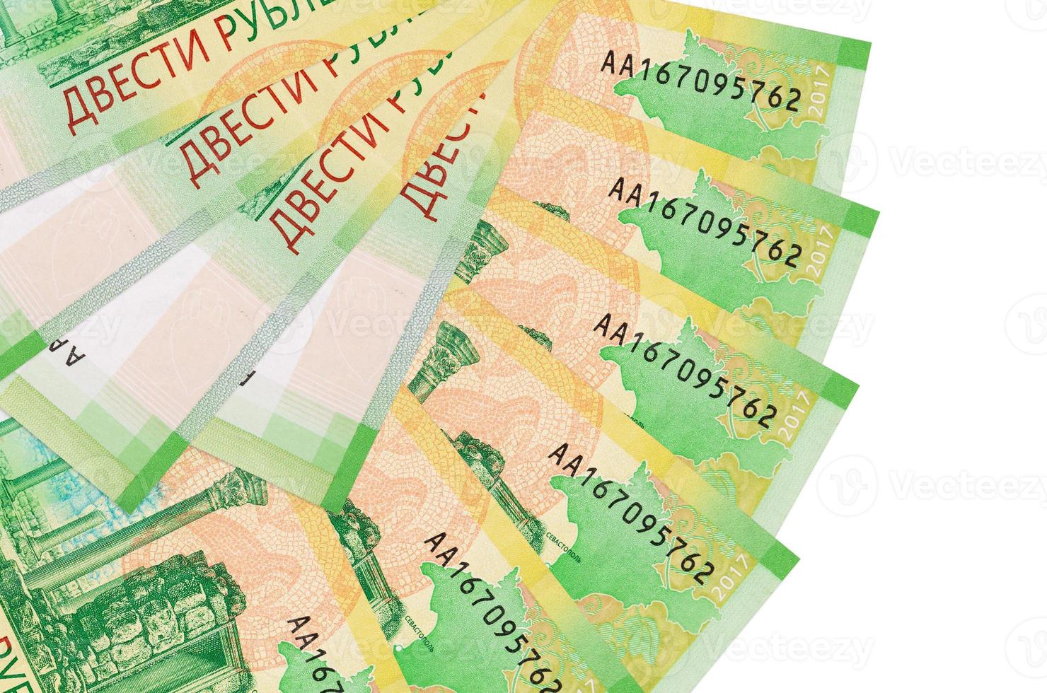 200 russian rubles bills lies isolated on white background with copy space stacked in fan shape close up photo