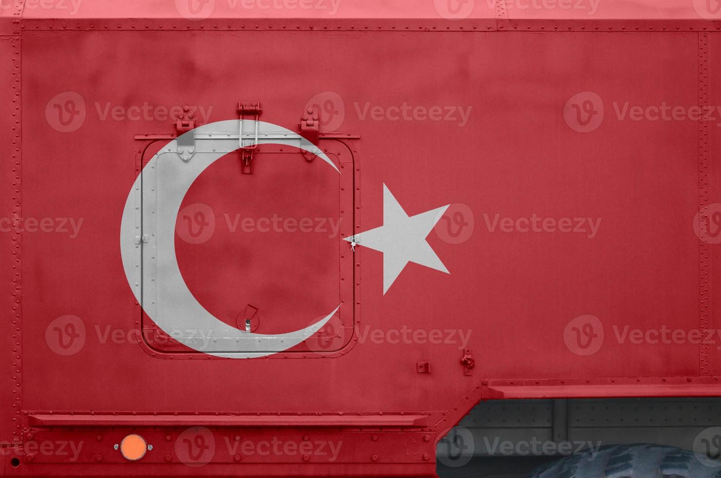 Turkey flag depicted on side part of military armored truck closeup. Army forces conceptual background photo