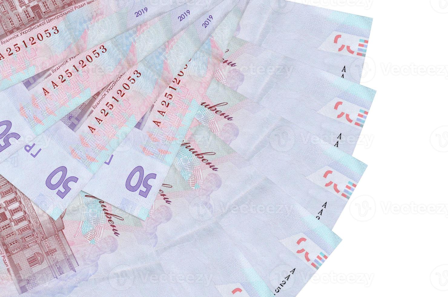 50 Ukrainian hryvnias bills lies isolated on white background with copy space stacked in fan shape close up photo